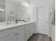 Bathroom featuring double sinks, ample counter space, and modern fixtures at 668 Rycola Circle, Surfside Beach, SC 29575