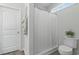 Clean bathroom with white fixtures and a shower-tub combination at 668 Rycola Circle, Surfside Beach, SC 29575