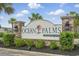Welcoming community sign 'Ocean Palms' at Beverly Homes, surrounded by manicured landscaping at 668 Rycola Circle, Surfside Beach, SC 29575