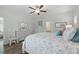 Comfortable main bedroom with wood floors and decorative white dresser at 668 Rycola Circle, Surfside Beach, SC 29575