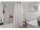 Bright bathroom featuring a shower-tub combination, clean fixtures, and ample storage at 708 15Th Ave., Conway, SC 29526
