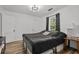 Comfortable bedroom with hardwood floors, natural light, and a cozy atmosphere at 708 15Th Ave., Conway, SC 29526