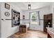 Lovely dining area with custom table and seats, stylish lighting, and wooden cabinets at 708 15Th Ave., Conway, SC 29526