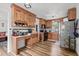 Traditional kitchen design featuring dark appliances, wooden cabinets, white countertops, and stylish tile backsplash at 708 15Th Ave., Conway, SC 29526