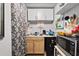 Functional kitchenette features modern appliances, wooden cabinets, and ample storage space, ideal for easy meal prep at 708 15Th Ave., Conway, SC 29526