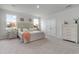 Bright and spacious bedroom with neutral tones, natural light, and ample closet space offering comfort and style at 7147 Shooting Star Way, Myrtle Beach, SC 29579