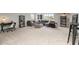 Spacious bonus room with neutral carpet, versatile layout, and ample natural light, perfect for entertaining at 7147 Shooting Star Way, Myrtle Beach, SC 29579