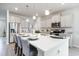 Kitchen featuring a large quartz island, pendant lights, and stainless steel appliances at 7147 Shooting Star Way, Myrtle Beach, SC 29579