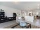 Open floor plan with views of the kitchen, stylish furnishings, and neutral colors create a modern living space at 7147 Shooting Star Way, Myrtle Beach, SC 29579