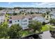 Aerial view of property featuring pond, parking and landscaping at 8658 Southbridge Dr. # L, Myrtle Beach, SC 29575