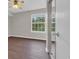 Bedroom featuring wood floors, a ceiling fan, and a sliding door closet at 8658 Southbridge Dr. # L, Myrtle Beach, SC 29575