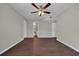 Spacious living room features wood floors, gray walls, and ceiling fan at 8658 Southbridge Dr. # L, Myrtle Beach, SC 29575