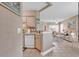 Bright and airy living area next to a kitchen with an open layout, ideal for entertaining at 876 Palmetto Trail # 103, Myrtle Beach, SC 29577