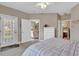 Bedroom view showing access to living room, bathroom, and outdoor patio at 876 Palmetto Trail # 103, Myrtle Beach, SC 29577