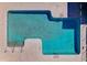 An aerial view of a private pool, showcasing its unique shape and surrounded patio space at 8861 Chandler Dr. # F, Surfside Beach, SC 29575