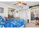 Bright bedroom with a wood bed frame and a large closet at 8861 Chandler Dr. # F, Surfside Beach, SC 29575