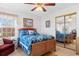 Bright bedroom featuring a wood bed frame and a large window at 8861 Chandler Dr. # F, Surfside Beach, SC 29575
