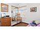 Bright bedroom with a rocking chair and a mirrored closet at 8861 Chandler Dr. # F, Surfside Beach, SC 29575
