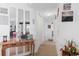 Welcoming entryway decorated with mirrors and decorative artwork creating an inviting space at 8861 Chandler Dr. # F, Surfside Beach, SC 29575