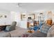 Open-concept living room with a view into the kitchen and dining area creating a great flow at 8861 Chandler Dr. # F, Surfside Beach, SC 29575