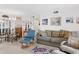 Spacious living room featuring neutral tones, comfortable seating, and decor at 8861 Chandler Dr. # F, Surfside Beach, SC 29575