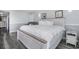 A spacious, bright bedroom provides a relaxing space to unwind with a view at 9550 Shore Dr. # 1430, Myrtle Beach, SC 29572