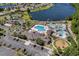 Aerial view of resort style community, lazy river, pool, clubhouse, playground, and tennis courts at 100 Culpepper Way # 1003, Myrtle Beach, SC 29579
