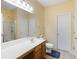 This bathroom features a vanity, toilet, and shower with glass doors at 100 Culpepper Way # 1003, Myrtle Beach, SC 29579
