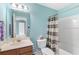 This bathroom features a vanity, toilet, and tub with a shower at 100 Culpepper Way # 1003, Myrtle Beach, SC 29579