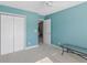 Bedroom with a closet and an open door to another room, ceiling fan, and bright walls at 100 Culpepper Way # 1003, Myrtle Beach, SC 29579