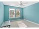 Bright bedroom features two windows letting in natural light and a ceiling fan at 100 Culpepper Way # 1003, Myrtle Beach, SC 29579