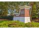 Community entrance with a brick sign for Berkshire Forest surrounded by manicured landscaping, creating a welcoming atmosphere at 100 Culpepper Way # 1003, Myrtle Beach, SC 29579