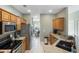 Galley style kitchen with stainless steel appliances, granite countertops, and lots of storage space at 100 Culpepper Way # 1003, Myrtle Beach, SC 29579