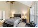 Bright main bedroom featuring a high ceiling, natural light and an ensuite bathroom at 100 Culpepper Way # 1003, Myrtle Beach, SC 29579