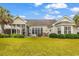 Spacious backyard with a view of the lake at 105 Willow Bay Dr., Murrells Inlet, SC 29576