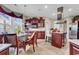 Well-appointed kitchen with stainless steel appliances, granite countertops, and cozy breakfast nook at 105 Willow Bay Dr., Murrells Inlet, SC 29576