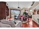 Spacious living room boasts vaulted ceilings, abundant natural light, and seamless flow to dining area at 105 Willow Bay Dr., Murrells Inlet, SC 29576