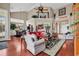 Bright and open living space with high ceilings, hardwood floors, and an adjoining dining area at 105 Willow Bay Dr., Murrells Inlet, SC 29576