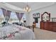 Inviting main bedroom with water view, large windows, and dresser at 105 Willow Bay Dr., Murrells Inlet, SC 29576