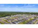 Aerial view showcasing the home's location within a Gathering-friendly neighborhood with a pond and nature at 1078 Saltgrass Way, Myrtle Beach, SC 29588