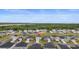 Aerial view of the neighborhood showcasing the home's location near a pond and green spaces at 1078 Saltgrass Way, Myrtle Beach, SC 29588