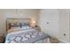 Calming bedroom features decorative headboard, side table and bright lamp at 1078 Saltgrass Way, Myrtle Beach, SC 29588