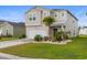Charming two-story home with a well-manicured lawn and attached two-car garage at 1078 Saltgrass Way, Myrtle Beach, SC 29588