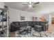 Cozy living room featuring a large sectional sofa and stylish decor at 1078 Saltgrass Way, Myrtle Beach, SC 29588