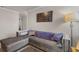 Elegant living room with a comfortable gray sectional sofa and stylish decor at 1078 Saltgrass Way, Myrtle Beach, SC 29588