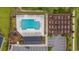 Aerial view of the community pool, gardens, playground, and parking spaces at 1078 Saltgrass Way, Myrtle Beach, SC 29588