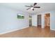 Bedroom with ceiling fan, television and open doorway to another room at 1125 Blue Stem Dr. # 29F, Pawleys Island, SC 29585