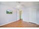 Bedroom with television, ceiling fan and an open doorway at 1125 Blue Stem Dr. # 29F, Pawleys Island, SC 29585