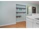 View of a kitchen with modern appliances and a bar with display shelves at 1125 Blue Stem Dr. # 29F, Pawleys Island, SC 29585