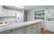 Open concept kitchen with modern appliances and a breakfast bar at 1125 Blue Stem Dr. # 29F, Pawleys Island, SC 29585